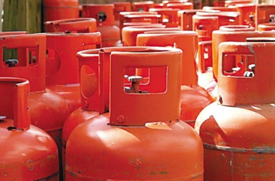 Rows of orange domestic LPG cylinders